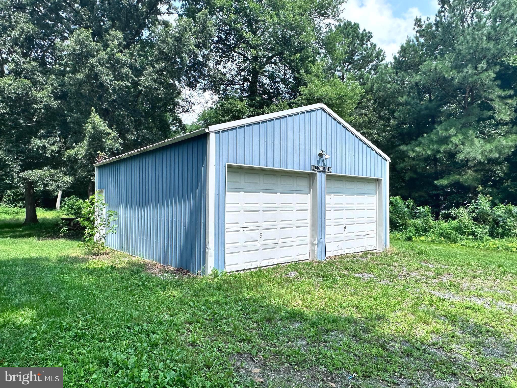 8027 Willow Grove Road Camden Wyoming, DE 19934 - Photo 7 of 16 a backyard of a house with lots of green space