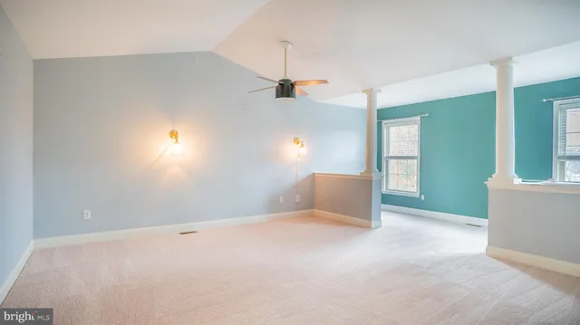 a view of a room with a window