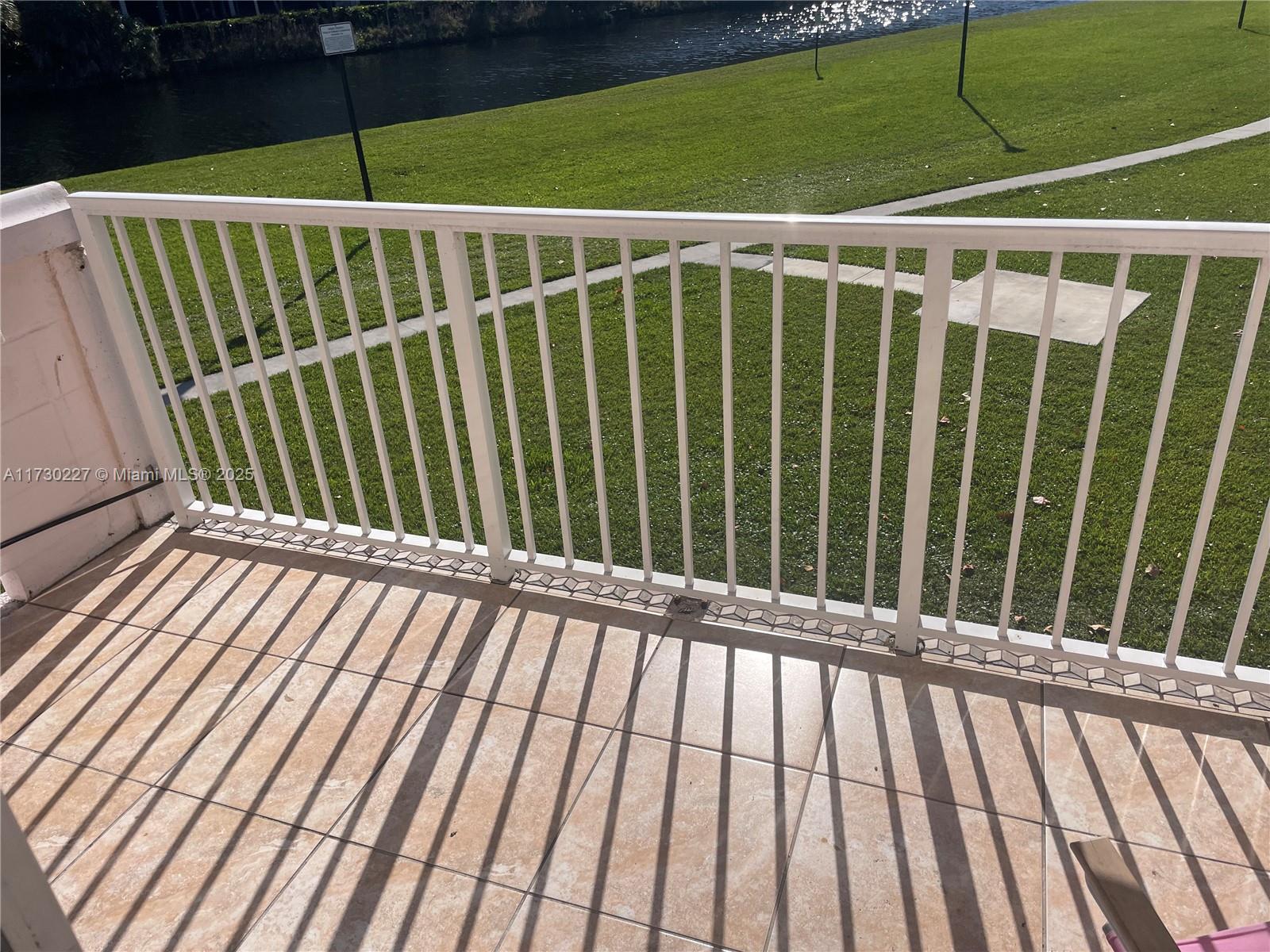 7348 Southwest 82nd Street, Unit C217 Miami, FL 33143 - Photo 19 of 19 a view of outdoor space with deck