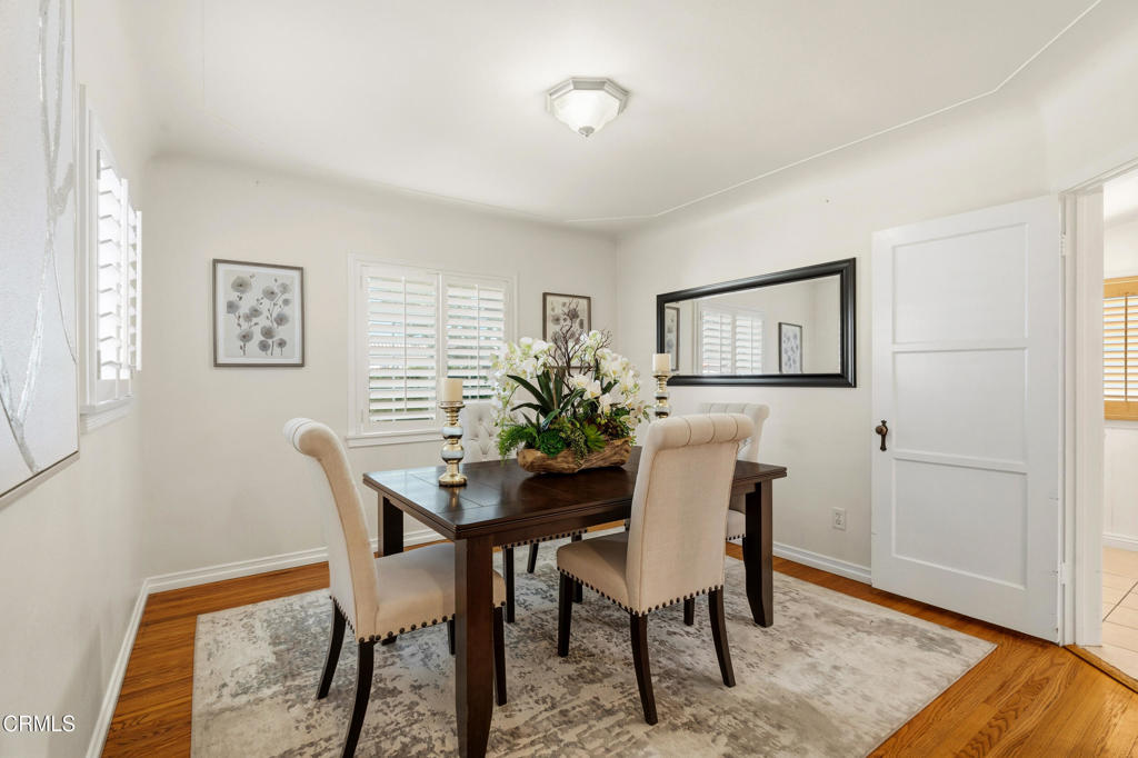 1809 South Palm Avenue Alhambra, CA 91803 - Photo 13 of 44 a view of a dining room with furniture and wooden floor