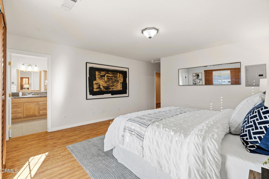 1809 South Palm Avenue Alhambra, CA 91803 - Photo 23 of 44 a bedroom with a bed and a view of kitchen