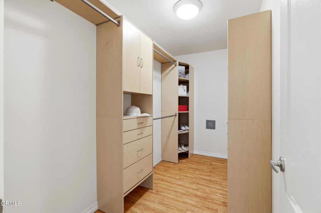 1809 South Palm Avenue Alhambra, CA 91803 - Photo 26 of 44 a view of walk in closet with clothes and shoes