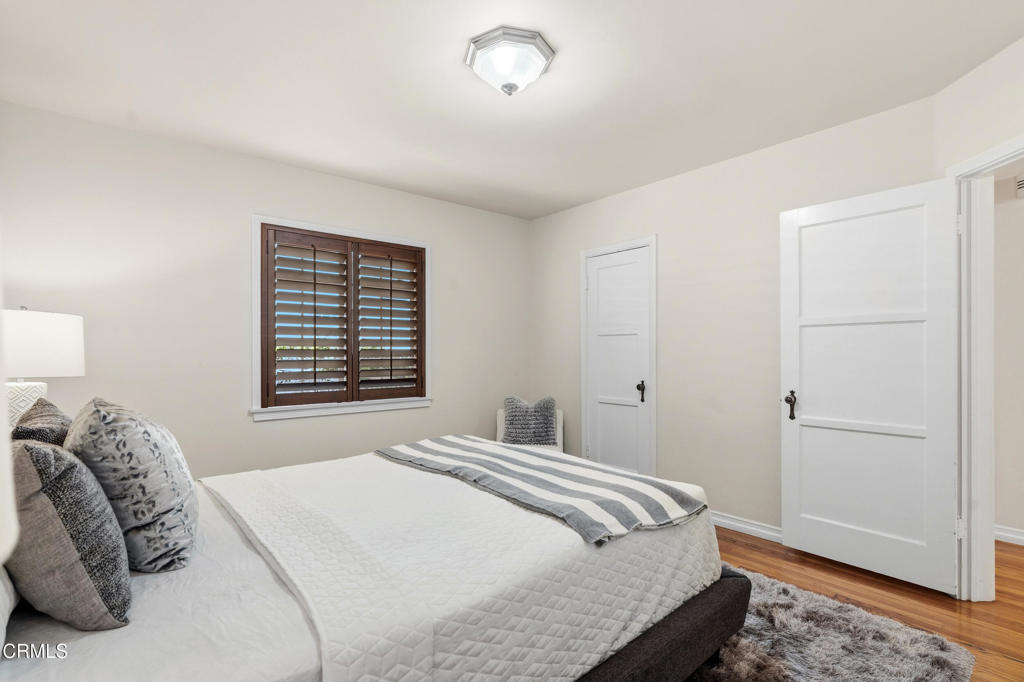 1809 South Palm Avenue Alhambra, CA 91803 - Photo 28 of 44 a bedroom with a bed and a window