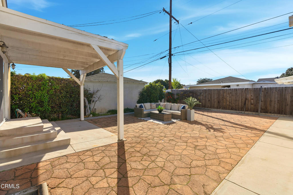1809 South Palm Avenue Alhambra, CA 91803 - Photo 32 of 44 a view of a patio with a table and chairs