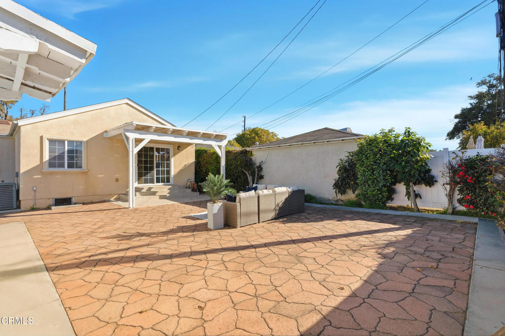 1809 South Palm Avenue Alhambra, CA 91803 - Photo 36 of 44 a front view of a house with a yard and garage