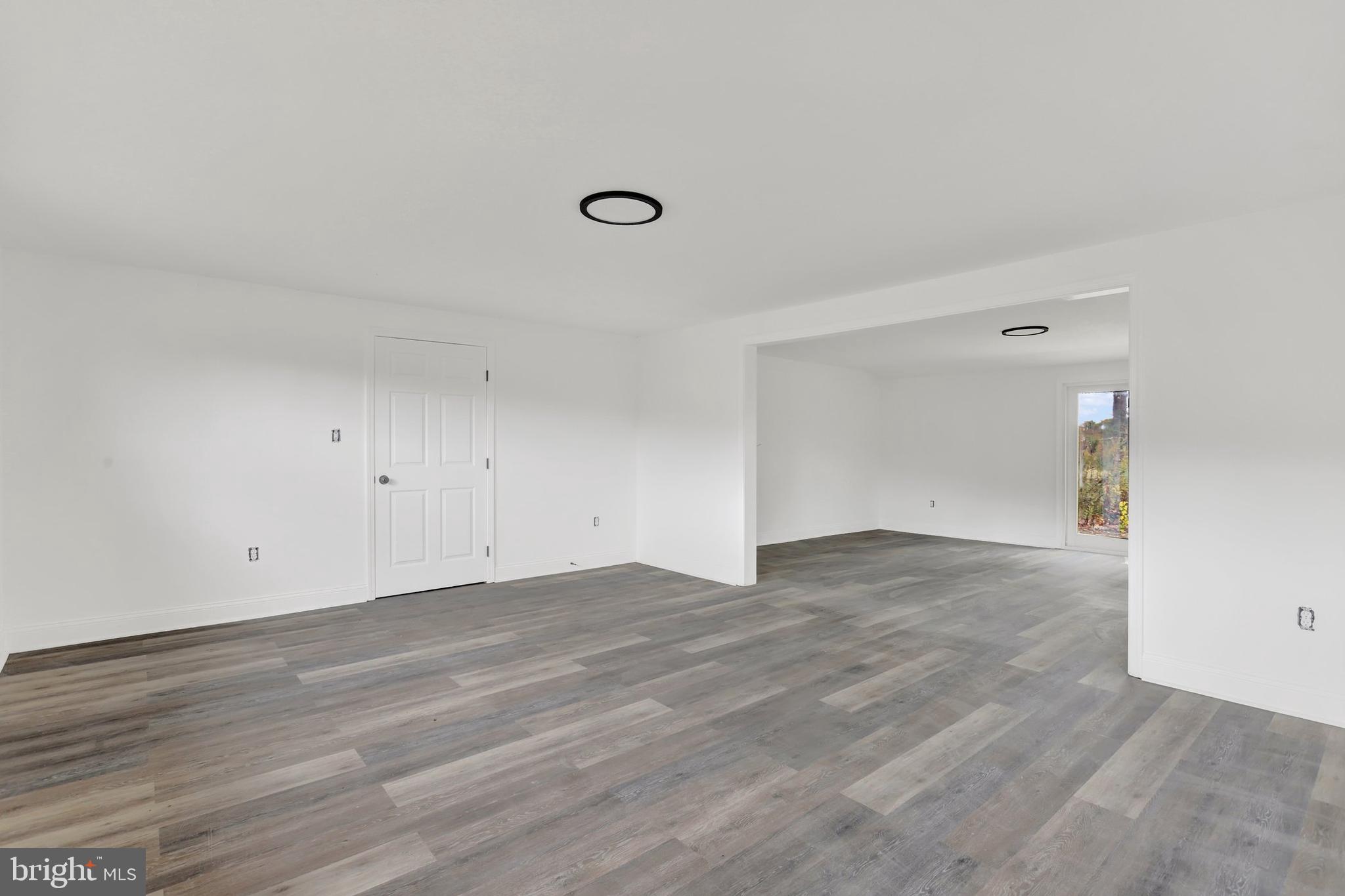 664 South Breezewood Road Breezewood, PA 15533 - Photo 11 of 24 a view of an empty room and wooden floor