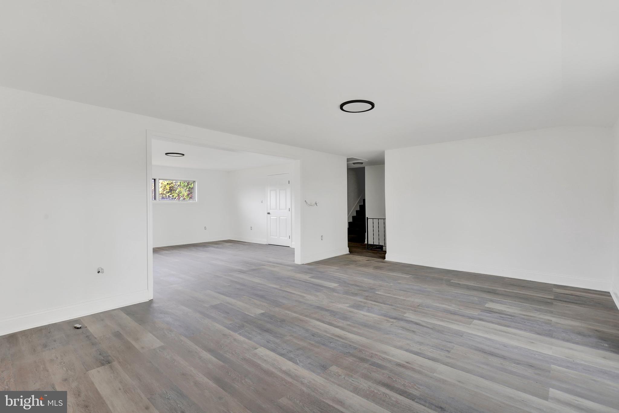664 South Breezewood Road Breezewood, PA 15533 - Photo 14 of 24 a view of an empty room with wooden floor