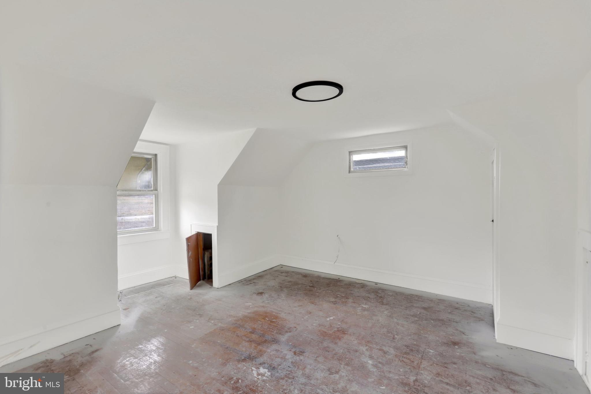 664 South Breezewood Road Breezewood, PA 15533 - Photo 21 of 24 a view of an empty room with windows