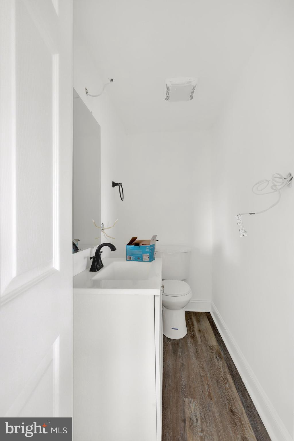 664 South Breezewood Road Breezewood, PA 15533 - Photo 8 of 24 a bathroom with a sink toilet and vanity