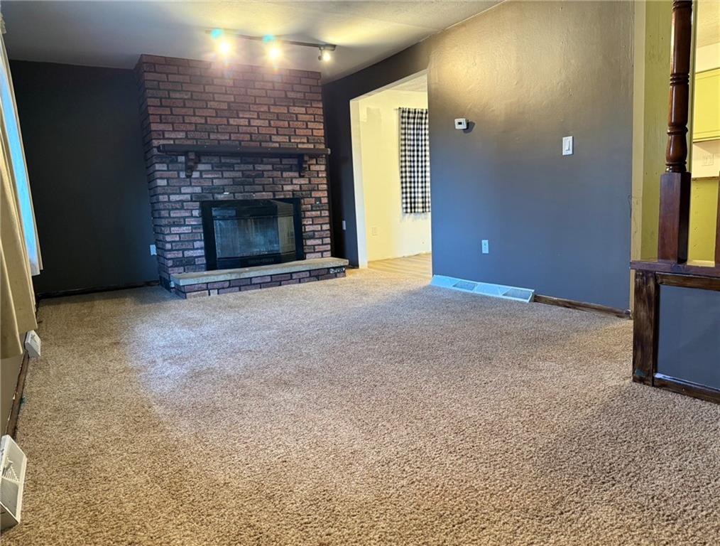 464 State Rte 1027 Kittanning, PA 16201 - Photo 17 of 24 a view of empty room with a fireplace