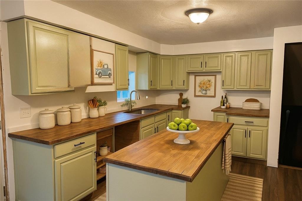 464 State Rte 1027 Kittanning, PA 16201 - Photo 3 of 24 a kitchen with a sink stove and cabinets