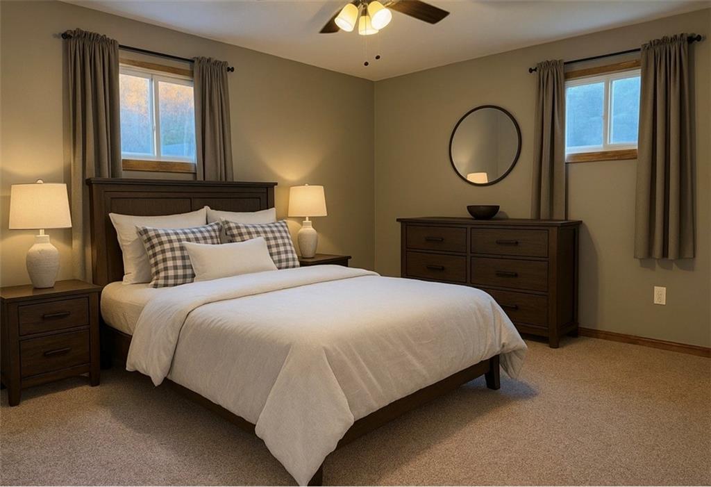 464 State Rte 1027 Kittanning, PA 16201 - Photo 7 of 24 a bedroom with a bed mirror on dresser and a chandelier