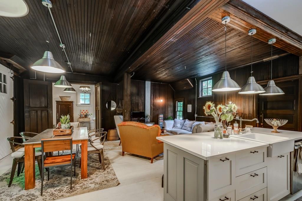 1540 Evergreen Road Pittsburgh, PA 15209 - Photo 21 of 25 main living area of carriage house with original barn doors