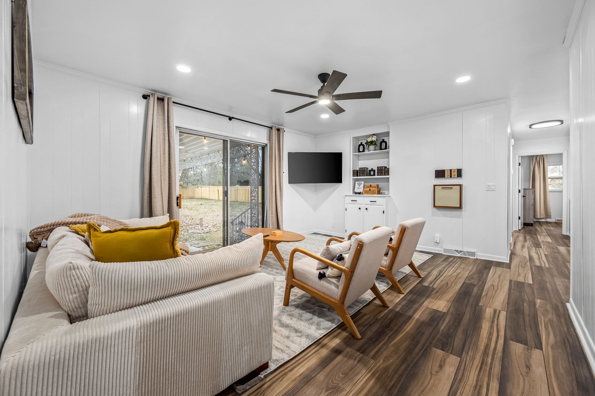 2614 Elam Road Murfreesboro, TN 37127 - Photo 34 of 97 a living room with furniture wooden floor and a flat screen tv