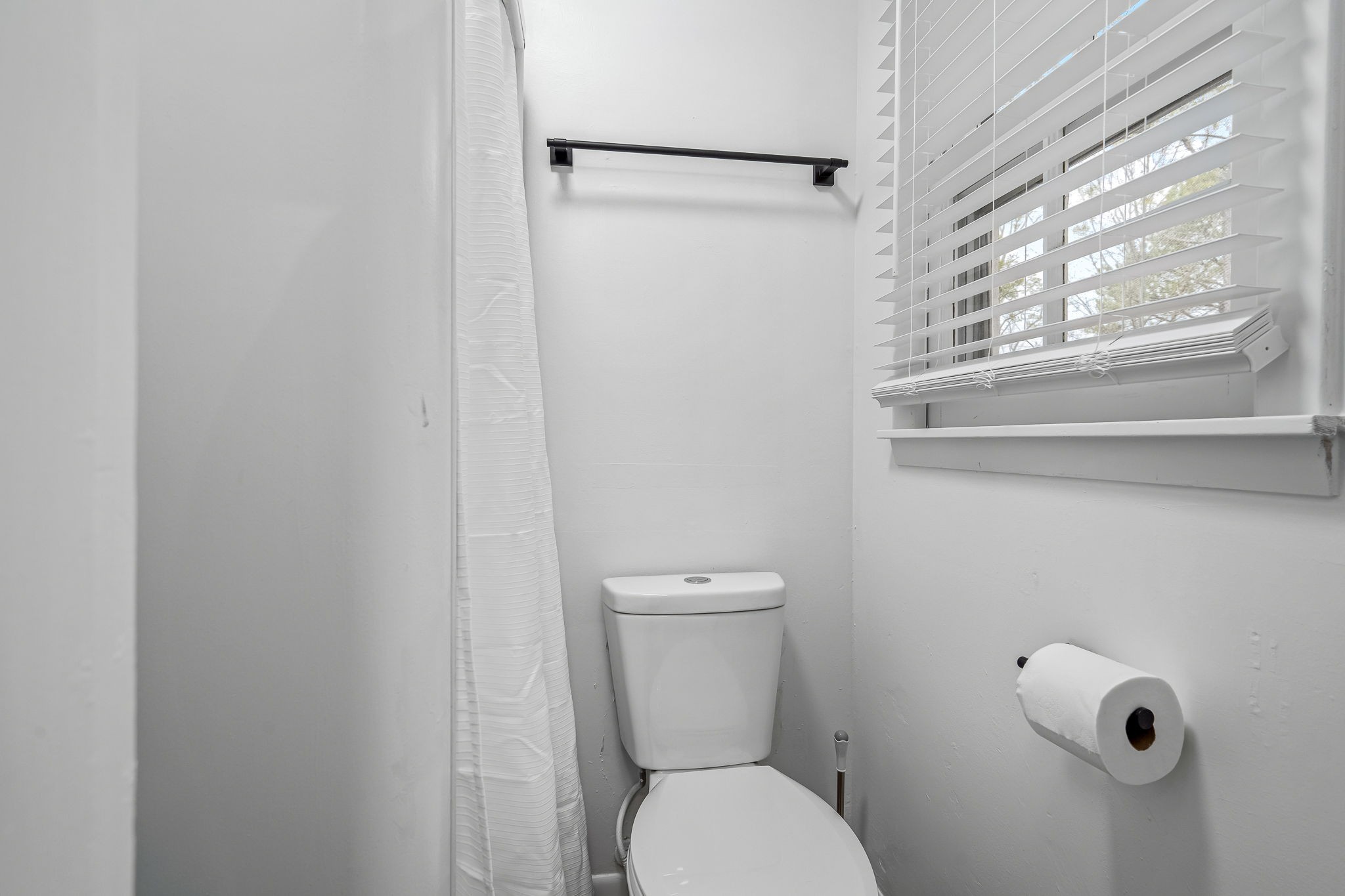 2614 Elam Road Murfreesboro, TN 37127 - Photo 49 of 97 a white toilet sitting next to a window