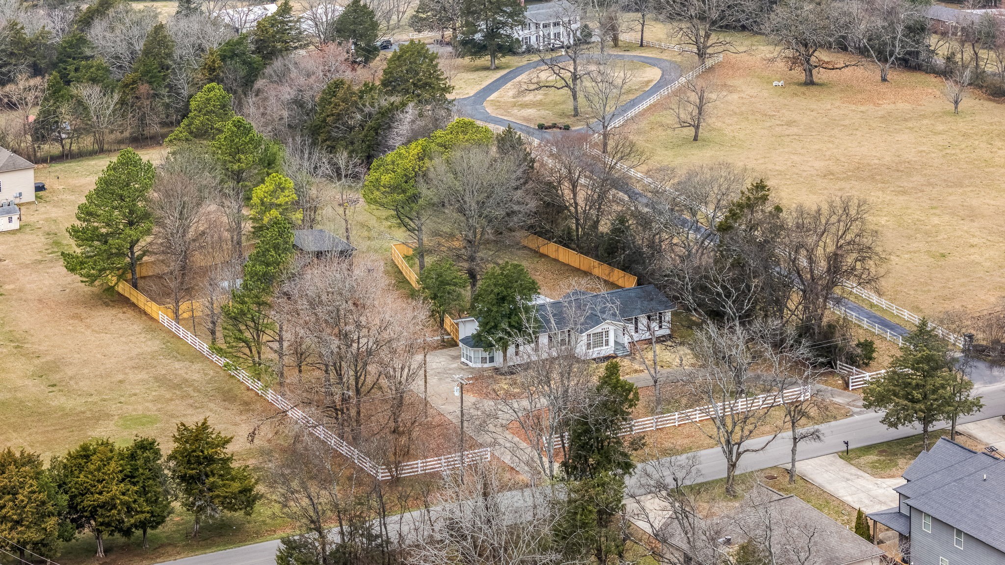 2614 Elam Road Murfreesboro, TN 37127 - Photo 81 of 97 a picture of a house with a yard and wooden fence