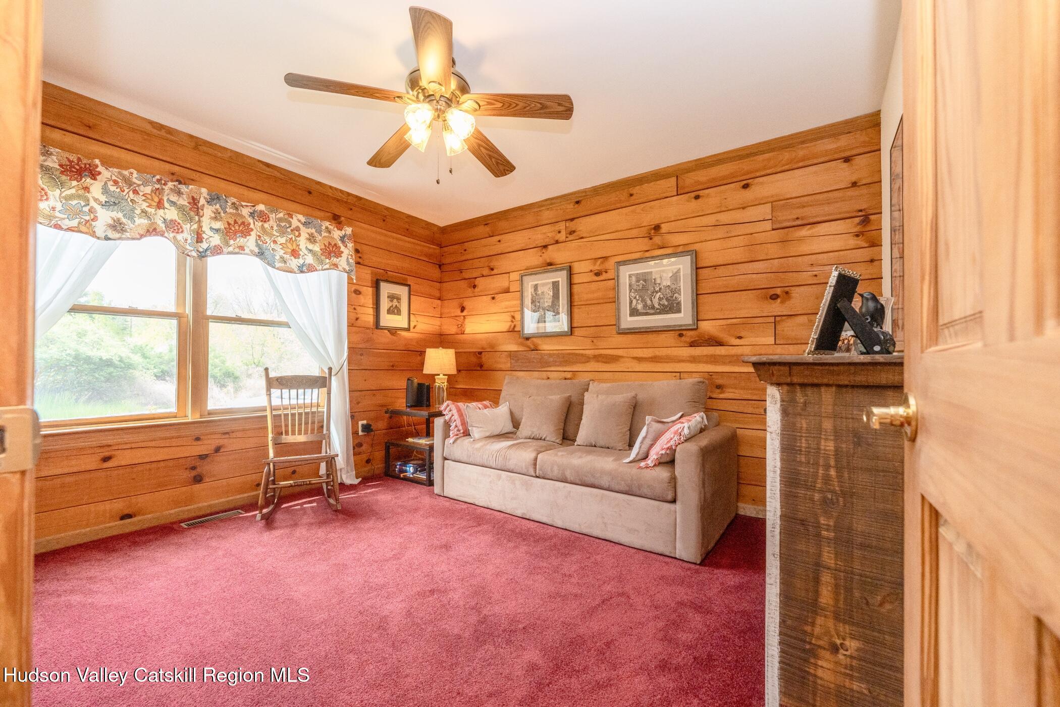 140 Stone Dock Road High Falls, NY 12440 - Photo 14 of 42 a living room with furniture and a flat screen tv