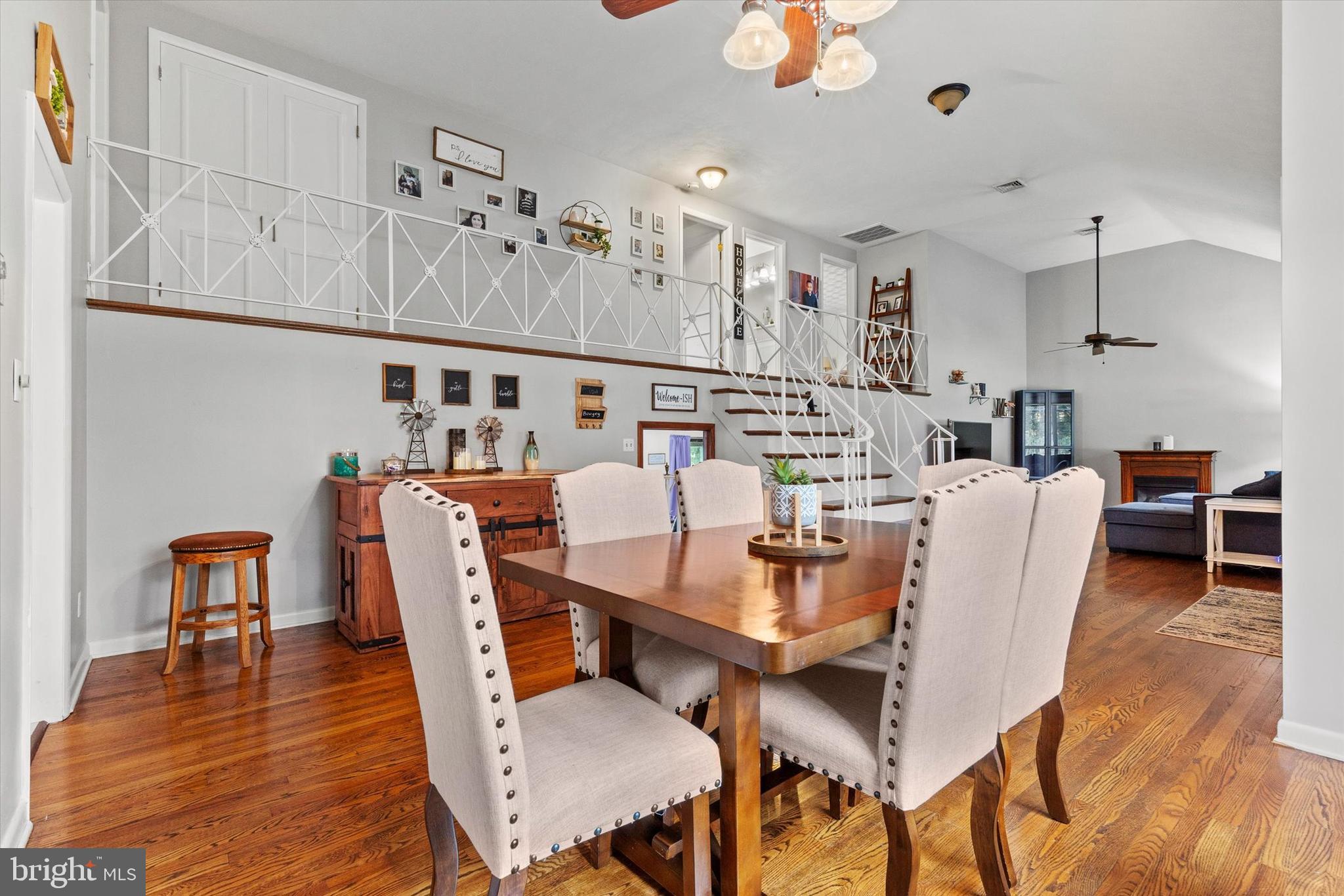 1605 Colonial Road Harrisburg, PA 17112 - Photo 11 of 39 a dining room with furniture a chandelier and wooden floor