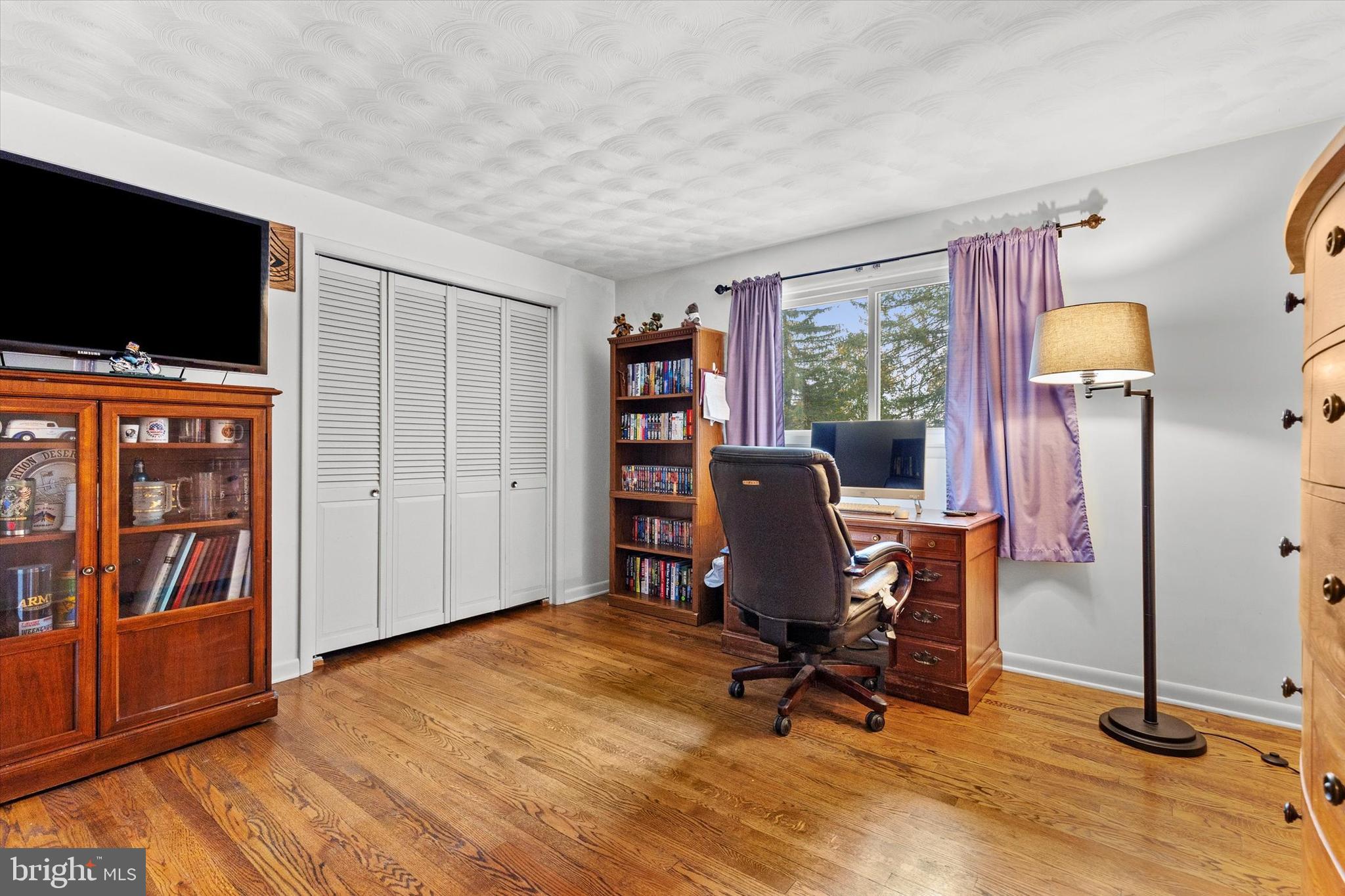 1605 Colonial Road Harrisburg, PA 17112 - Photo 21 of 39 a view of a workspace with furniture and a window