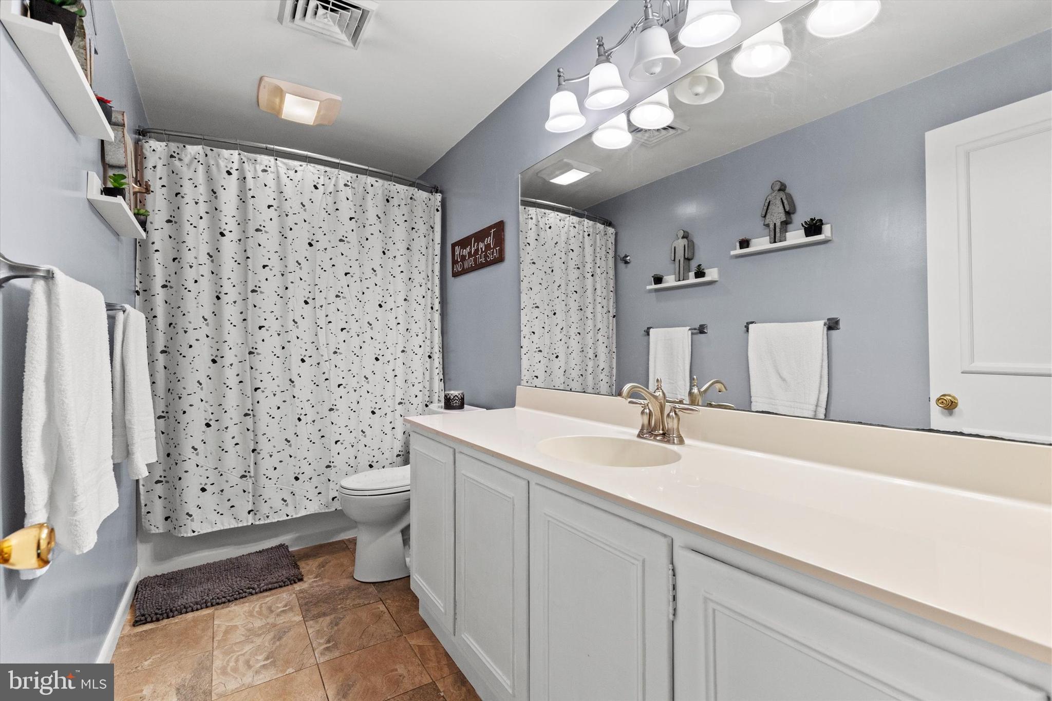 1605 Colonial Road Harrisburg, PA 17112 - Photo 23 of 39 a bathroom with a sink a toilet and shower