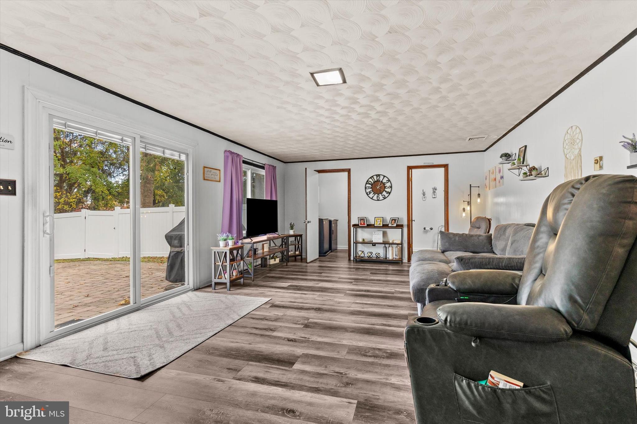 1605 Colonial Road Harrisburg, PA 17112 - Photo 26 of 39 a living room with furniture and a flat screen tv