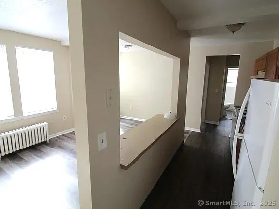 a view of livingroom with furniture and wooden floor