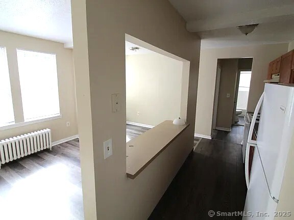 199 Collins Street, Unit 1B Hartford, CT 06105 - Photo 4 of 4 a view of livingroom with furniture and wooden floor