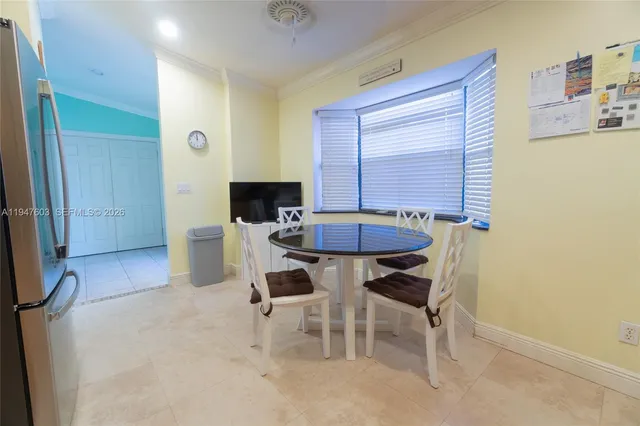 a table and chairs in a room