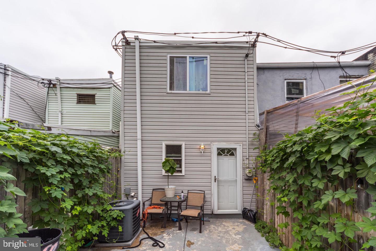 1833 East Albert Street Philadelphia, PA 19125 - Photo 12 of 13 a view of a house with a yard and sitting area