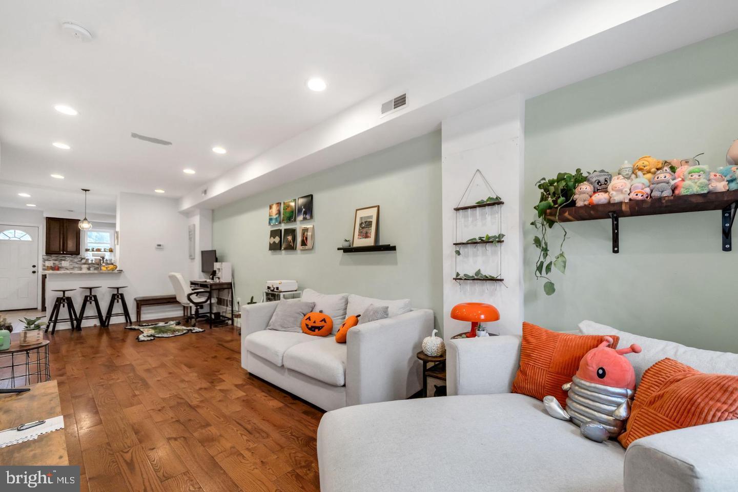 1833 East Albert Street Philadelphia, PA 19125 - Photo 2 of 13 a living room with furniture and a couch