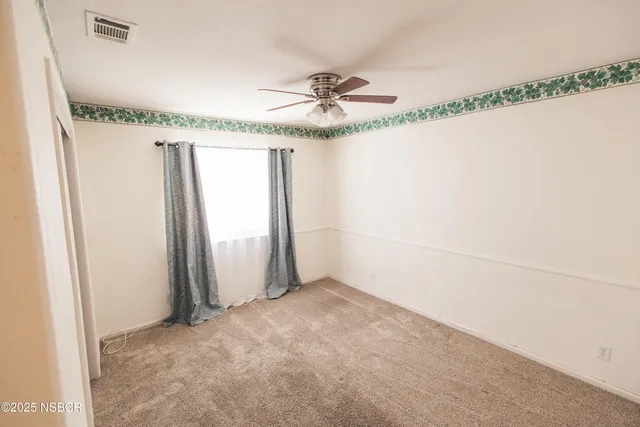 a bathroom with a sink a mirror and shower
