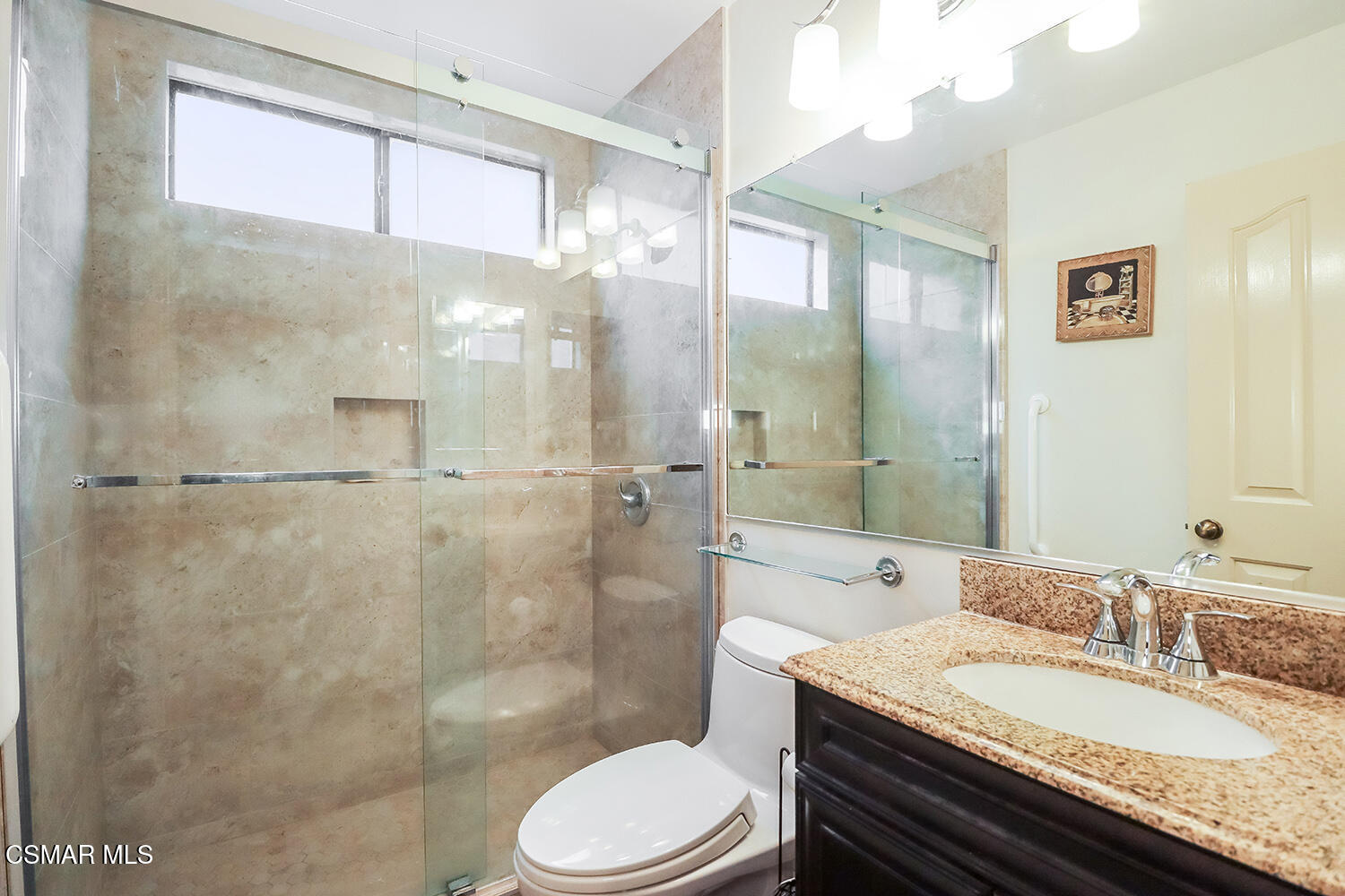 26914 Deerweed Trail Calabasas, CA 91301 - Photo 18 of 37 a bathroom with a granite countertop sink toilet a mirror and shower