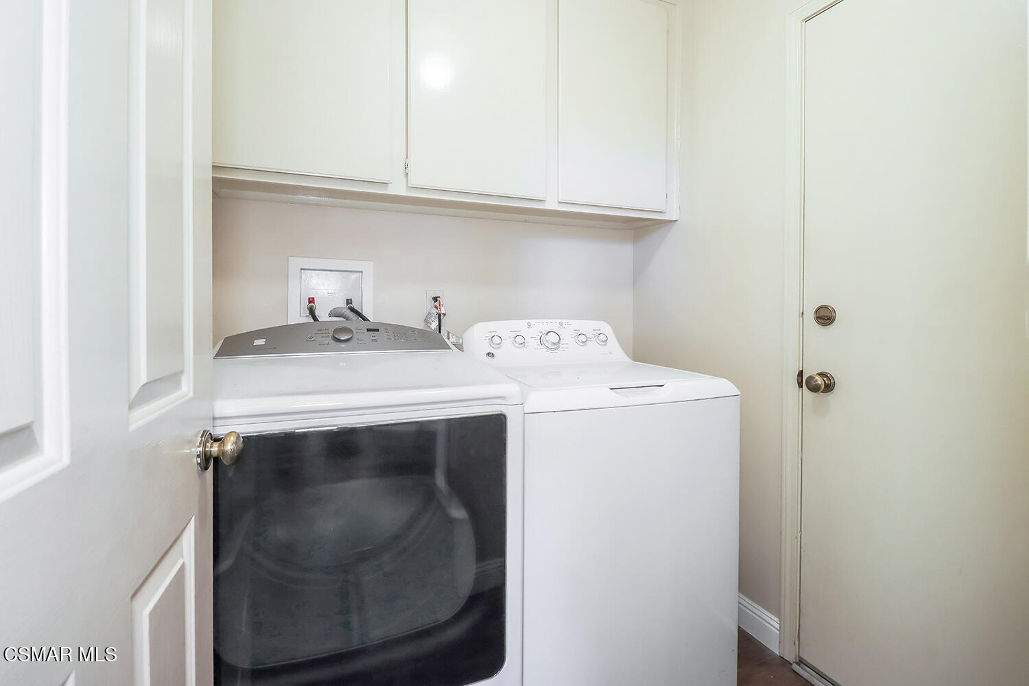 26914 Deerweed Trail Calabasas, CA 91301 - Photo 20 of 37 a utility room with dryer and washer