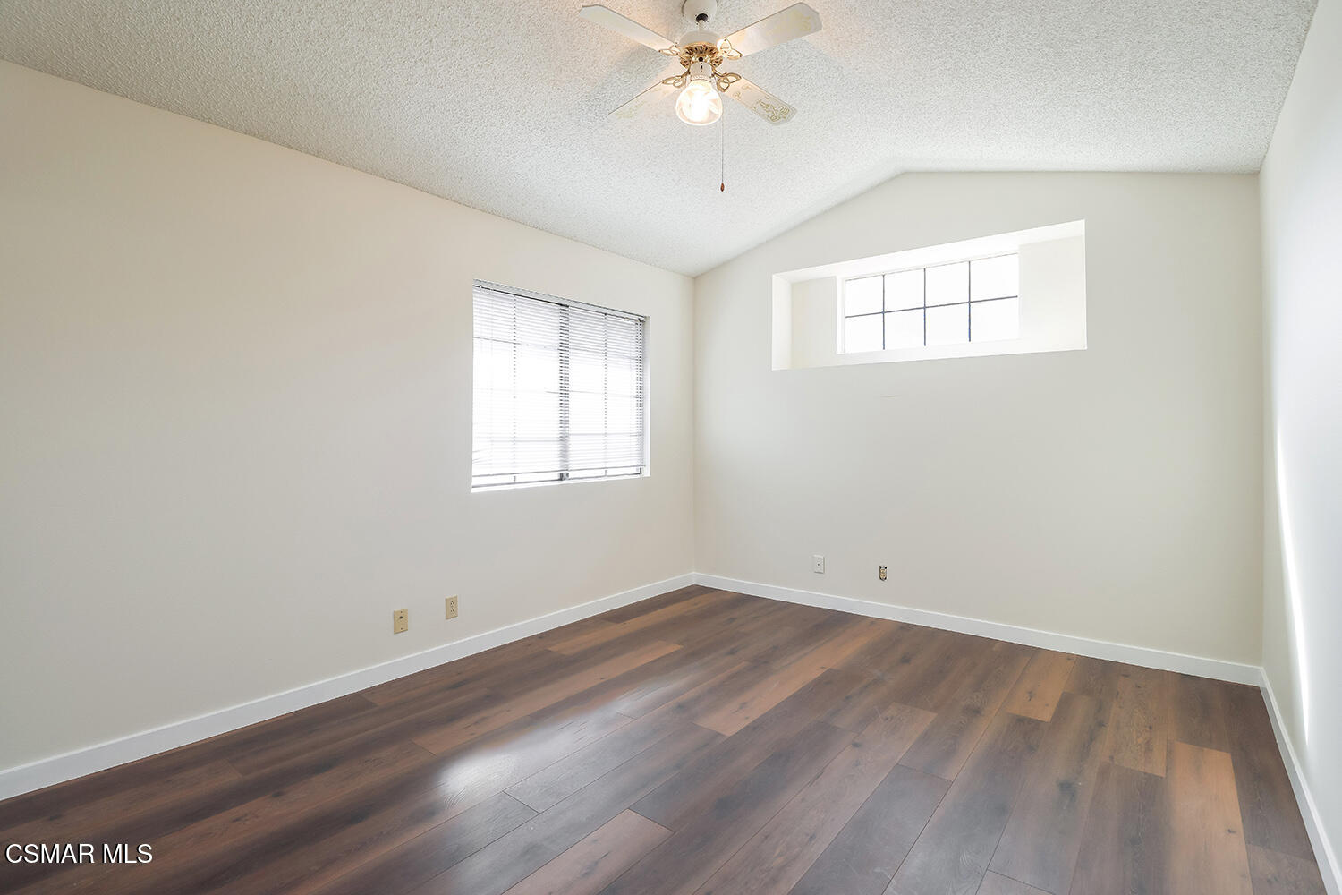 26914 Deerweed Trail Calabasas, CA 91301 - Photo 31 of 37 an empty room with wooden floor and windows