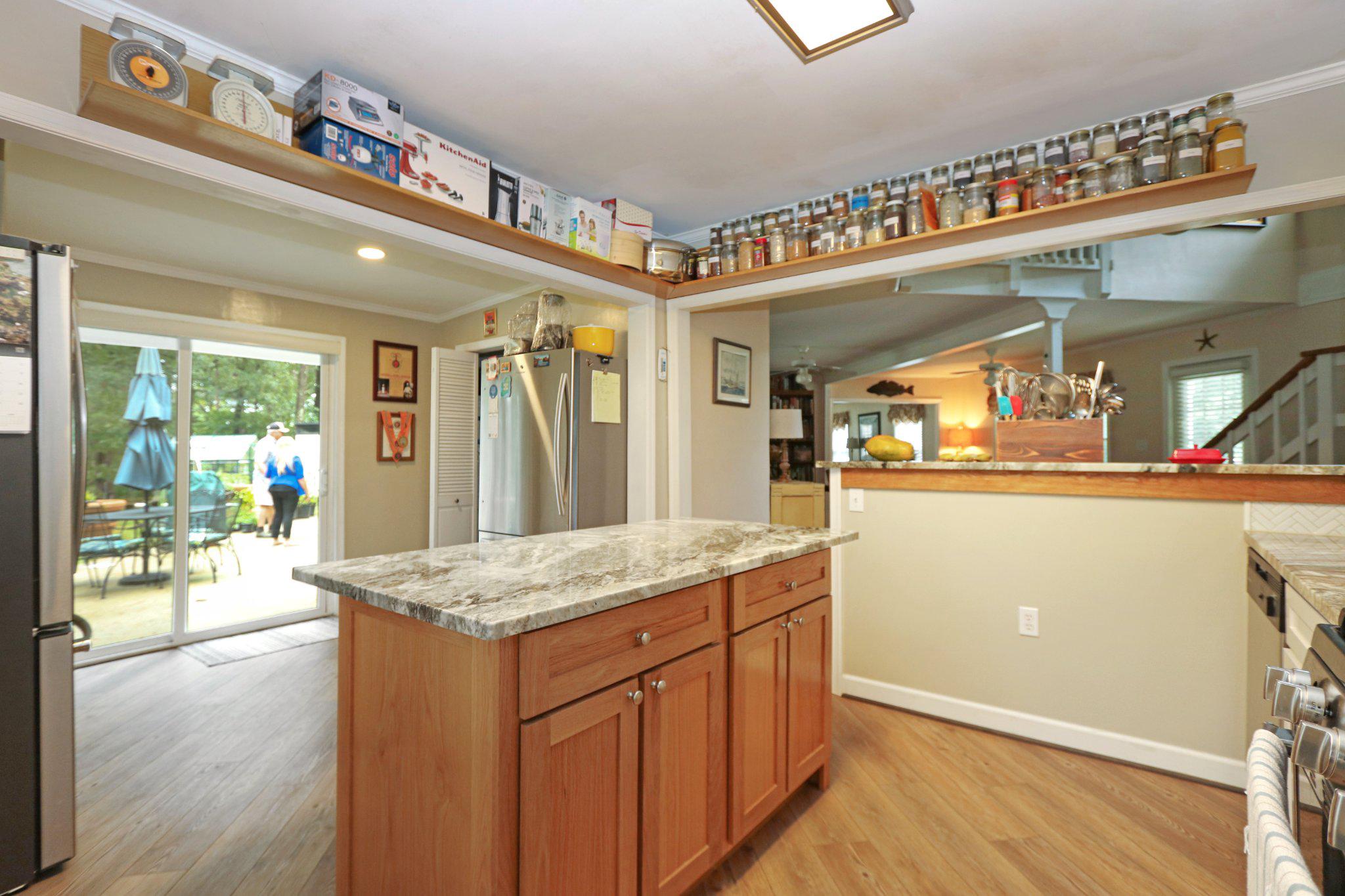 13431 Solitude Trail Machipongo, VA 23405 - Photo 15 of 32 Inviting kitchen with modern charm.