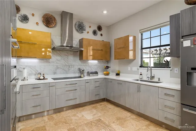 a kitchen with a sink cabinets and window