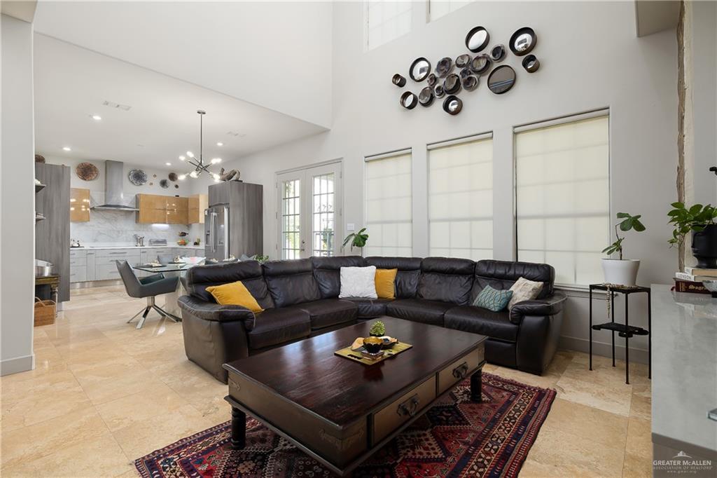 4500 Tyler Avenue McAllen, TX 78503 - Photo 9 of 27 a living room with furniture and kitchen view