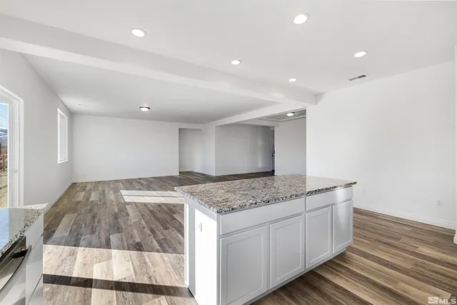 a utility room with a sink washer and dryer