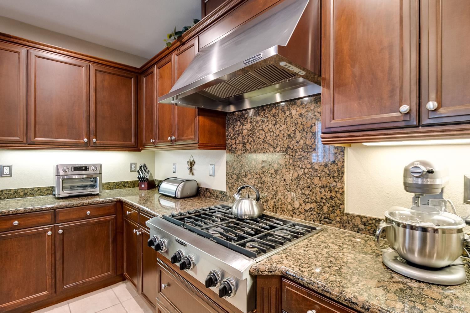 5325 Carole Ridge Court Fairfield, CA 94534 - Photo 31 of 75 a kitchen with a stove and a refrigerator