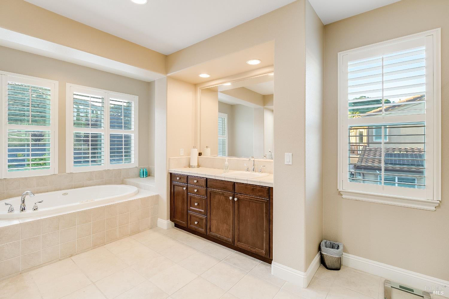 5325 Carole Ridge Court Fairfield, CA 94534 - Photo 42 of 75 a spacious bathroom with a tub sink shower and mirror