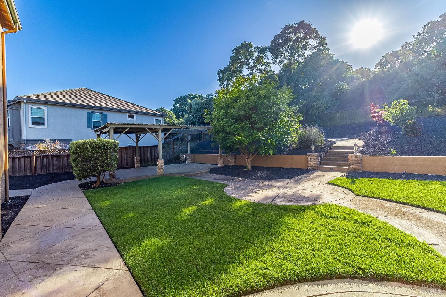 5325 Carole Ridge Court Fairfield, CA 94534 - Photo 69 of 75 a view of a backyard with plants and a patio