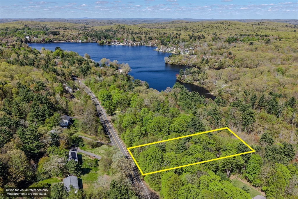 89 Stafford Road Wales, MA 01081 - Photo 1 of 8 a view of a yard