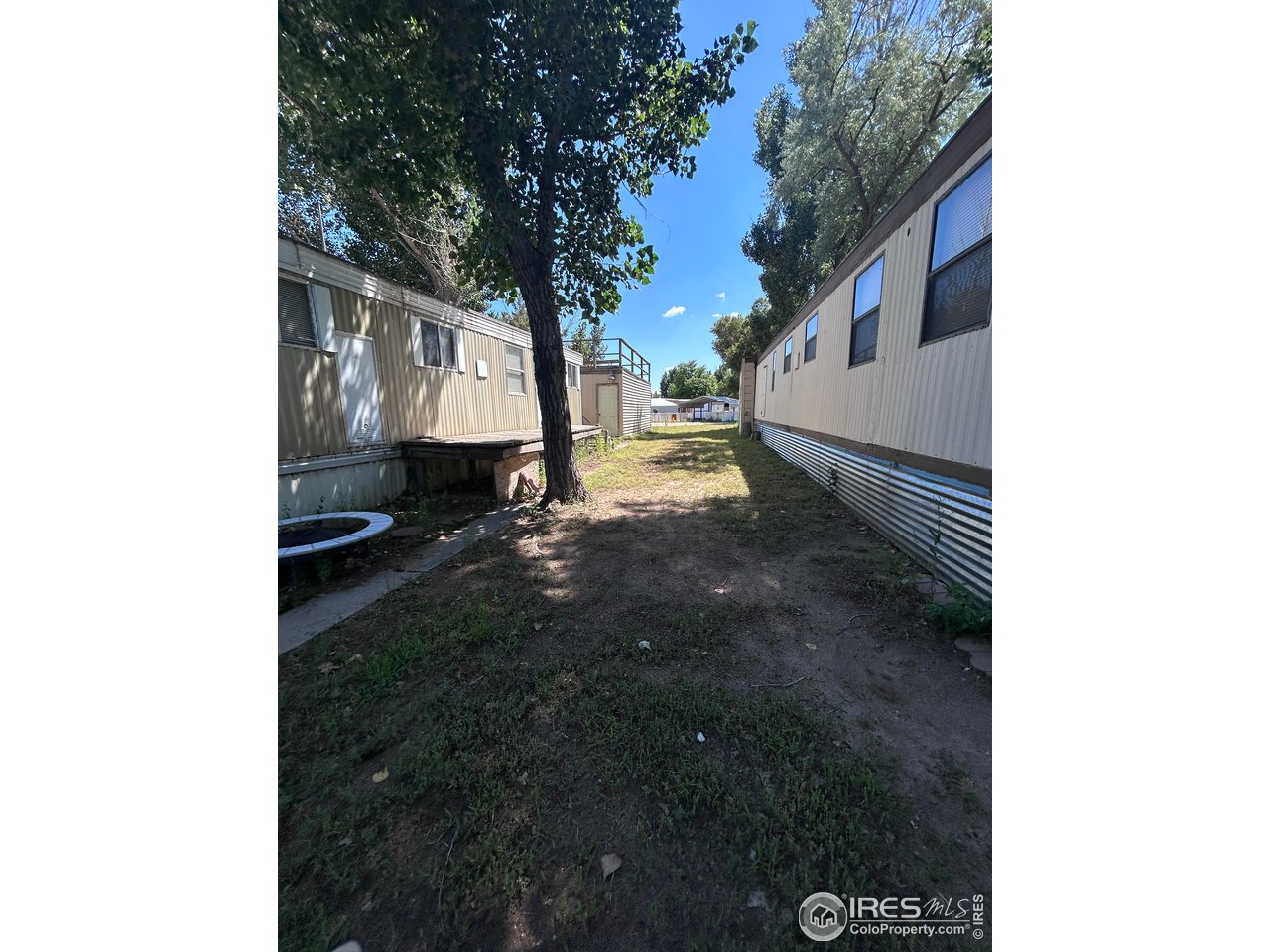 213 Kiowa Road Weldona, CO 80653 - Photo 2 of 25 a view of a backyard of the house