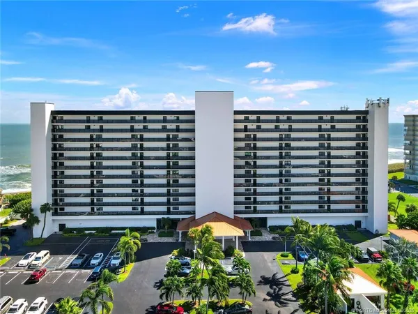 a view of building with yard