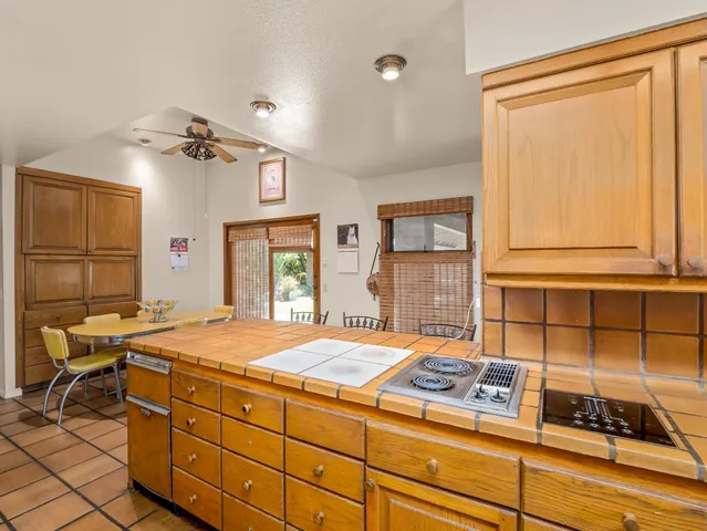 a large bathroom with a double vanity sink large mirror and bathtub