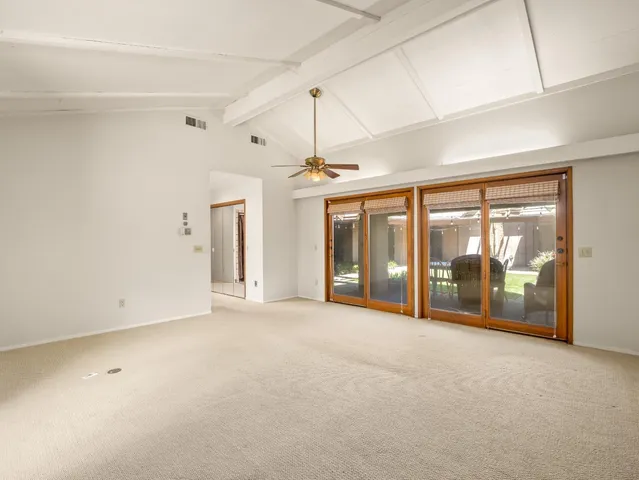 a spacious bathroom with a tub and shower