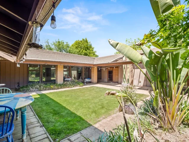 a view of lake with a yard