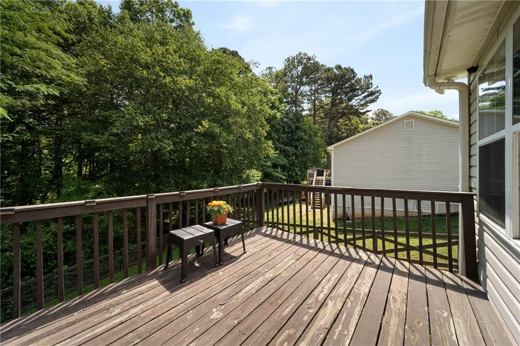 921 Pace Road Hiram, GA 30141 - Photo 26 of 41 a view of balcony with wooden floor and fence