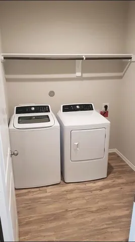 a utility room with dryer and washer