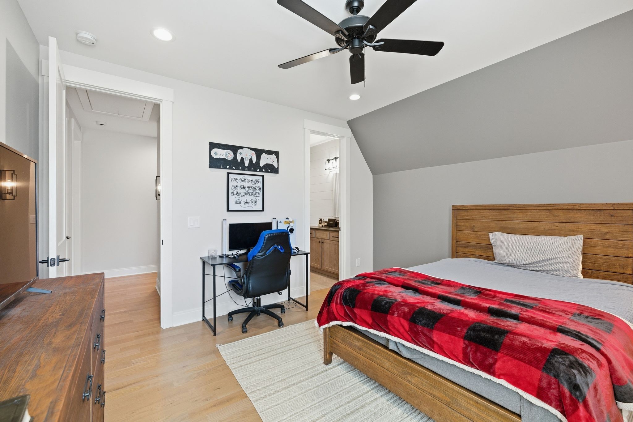 1733 Rigsby Avenue Murfreesboro, TN 37129 - Photo 38 of 57 a bedroom with a bed and a chandelier